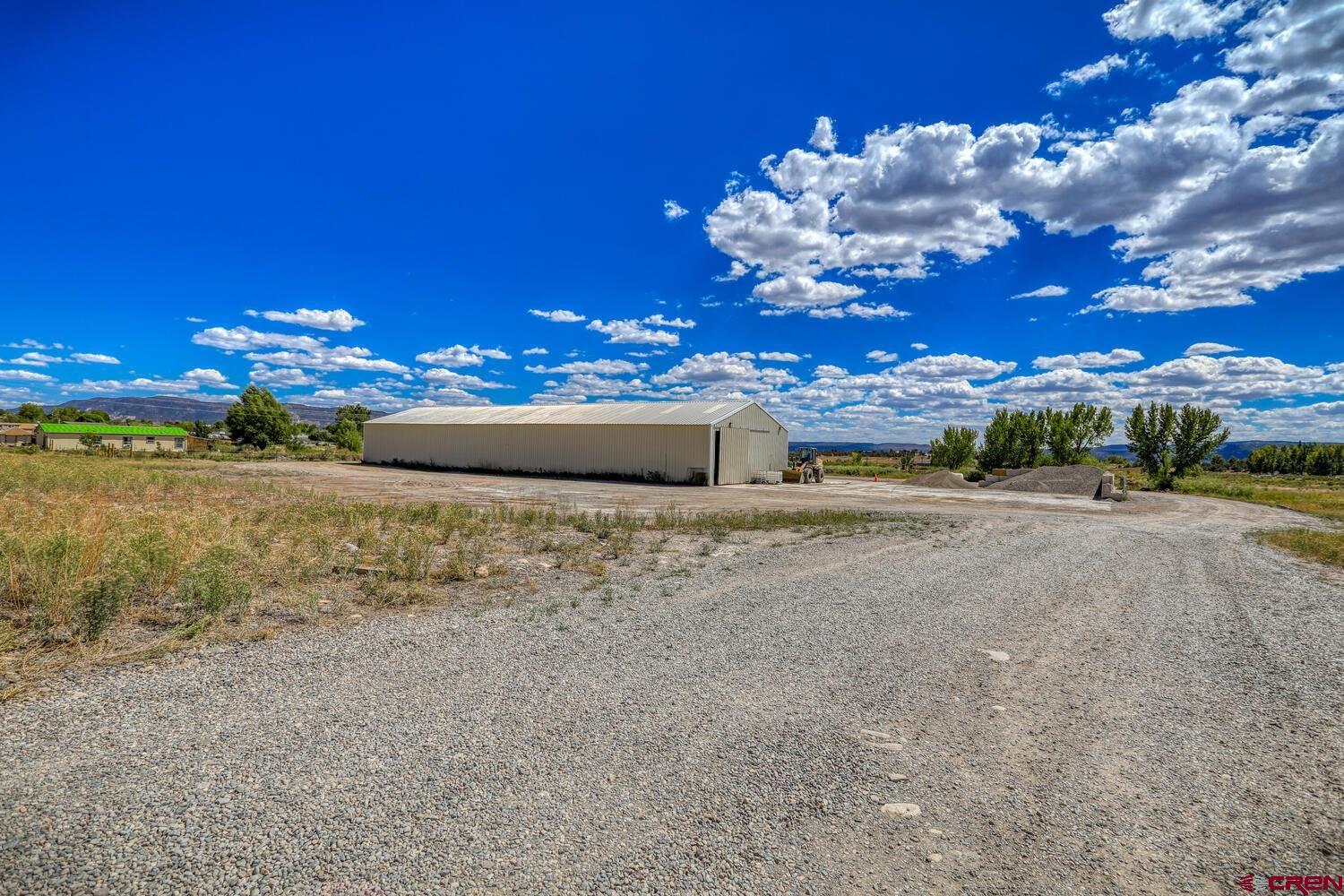 13806 State Highway Ignacio, CO 81137 - Photo 2 of 45 a view of a yard with flower plants and large tree