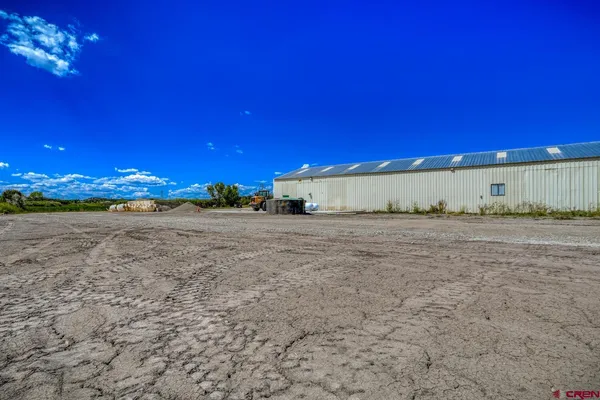 a view of a lake with outside of house