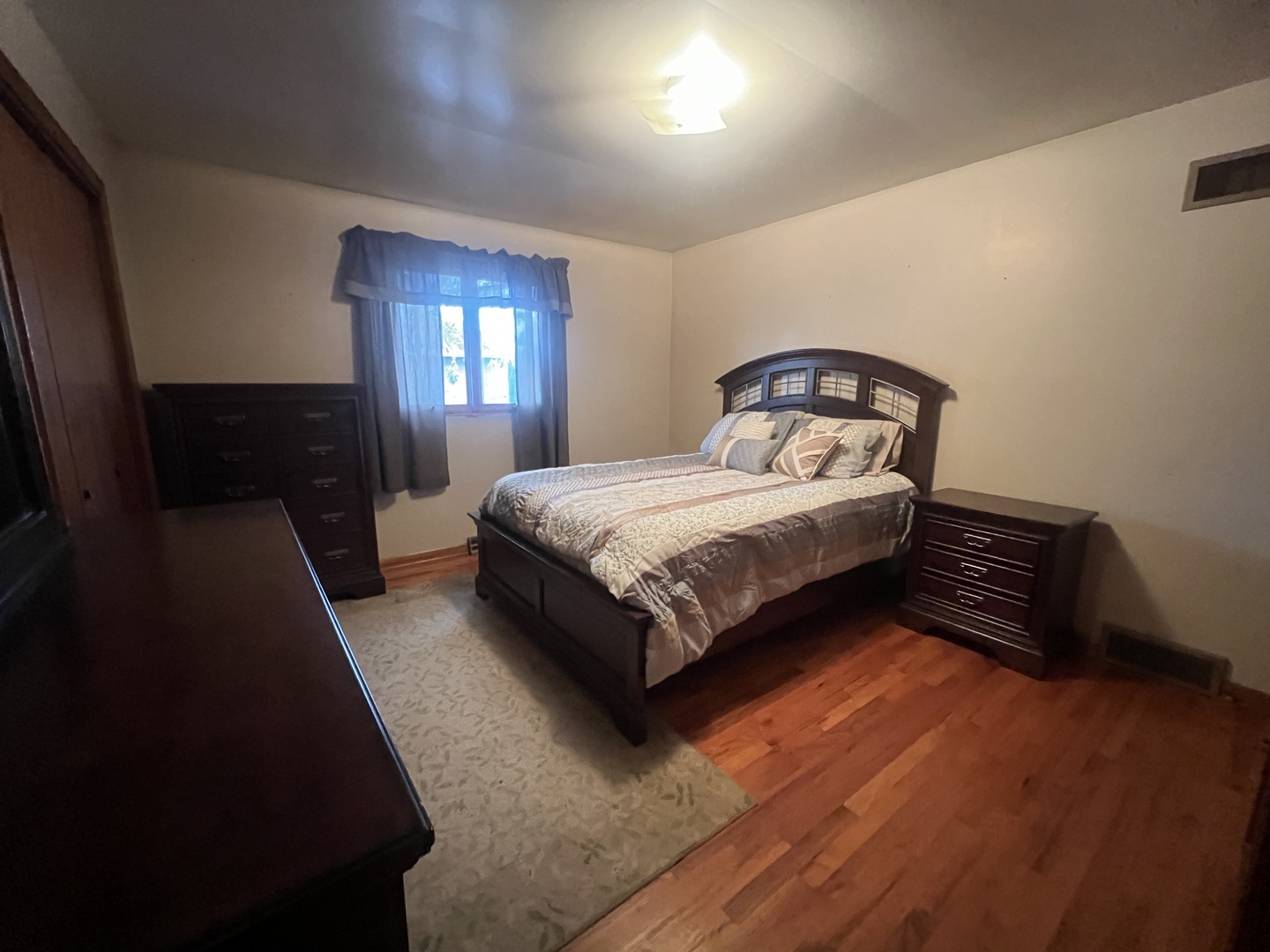 1380 South Regan Road New Lenox, IL 60451 - Photo 16 of 39 a bedroom with a bed and window