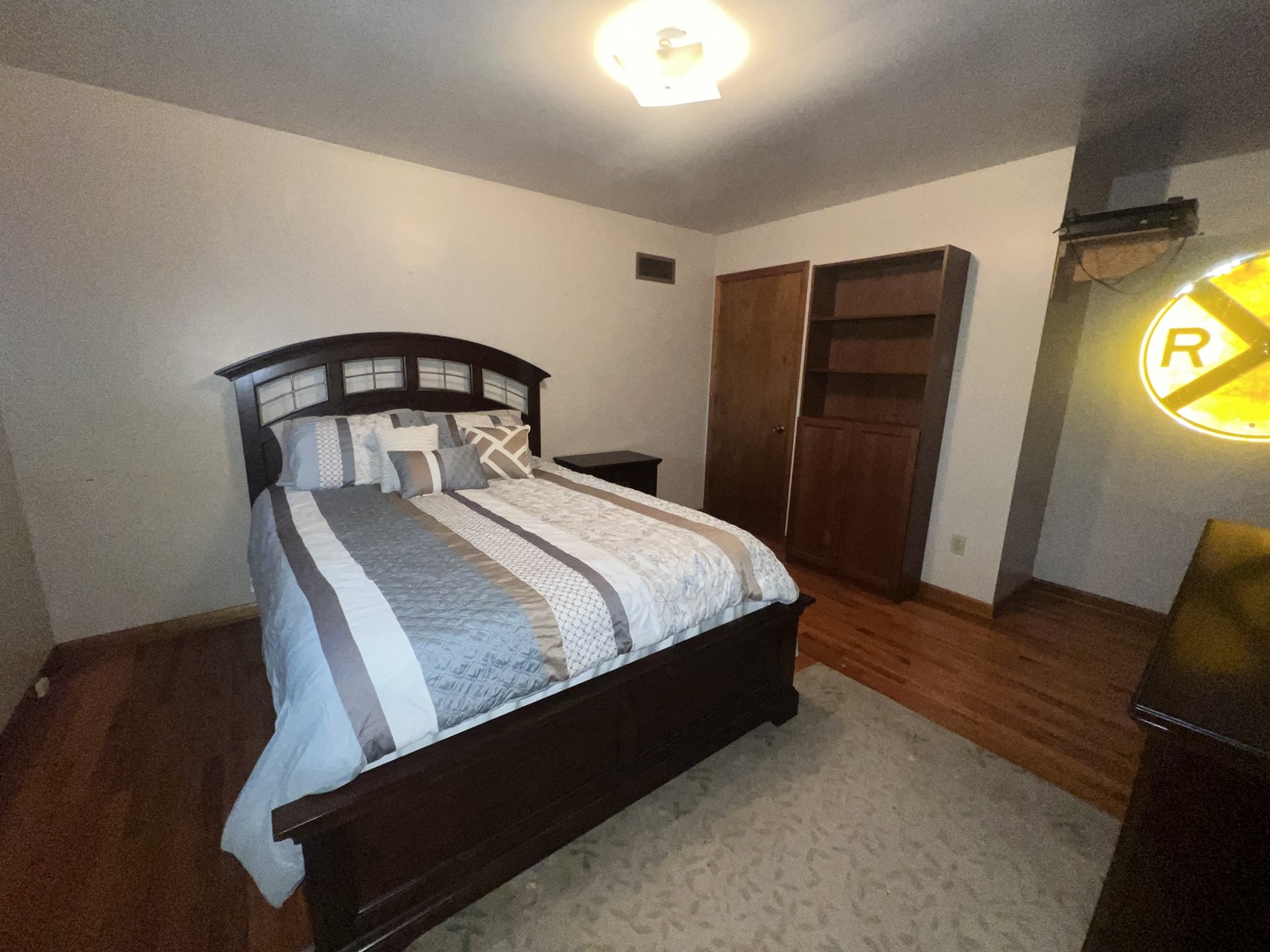 1380 South Regan Road New Lenox, IL 60451 - Photo 17 of 39 a bedroom with a bed and a mirror