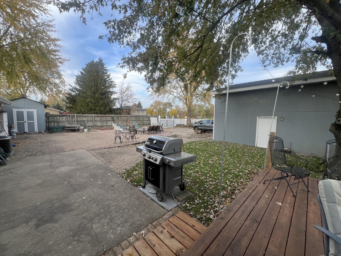 1380 South Regan Road New Lenox, IL 60451 - Photo 35 of 39 a view of a backyard with sitting area