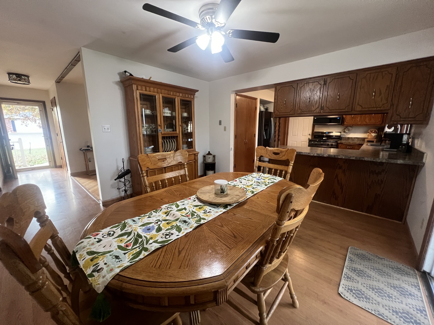 1380 South Regan Road New Lenox, IL 60451 - Photo 6 of 39 a view of a dining room with furniture