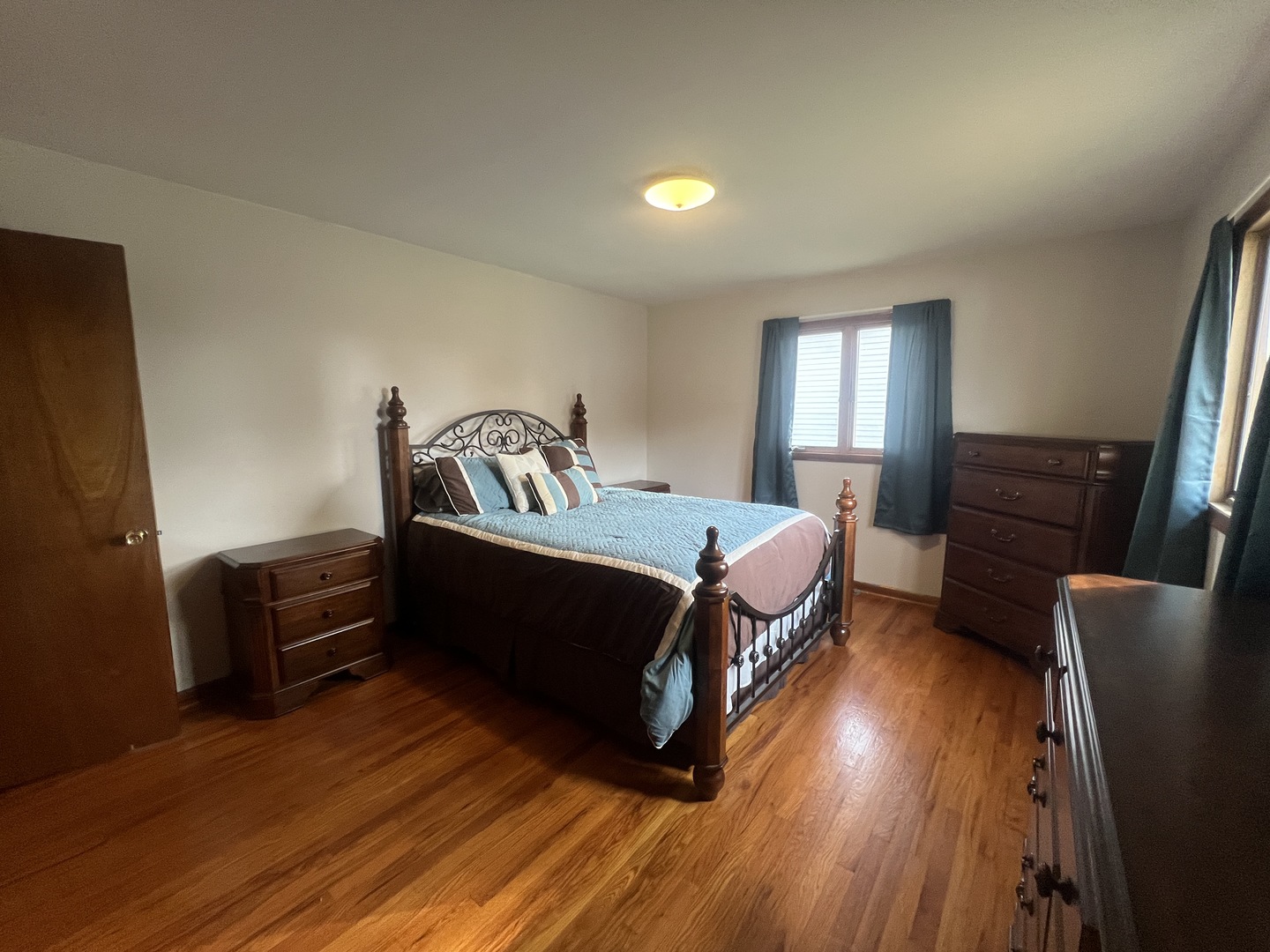 1380 South Regan Road New Lenox, IL 60451 - Photo 10 of 39 a bedroom with a bed and wooden floor