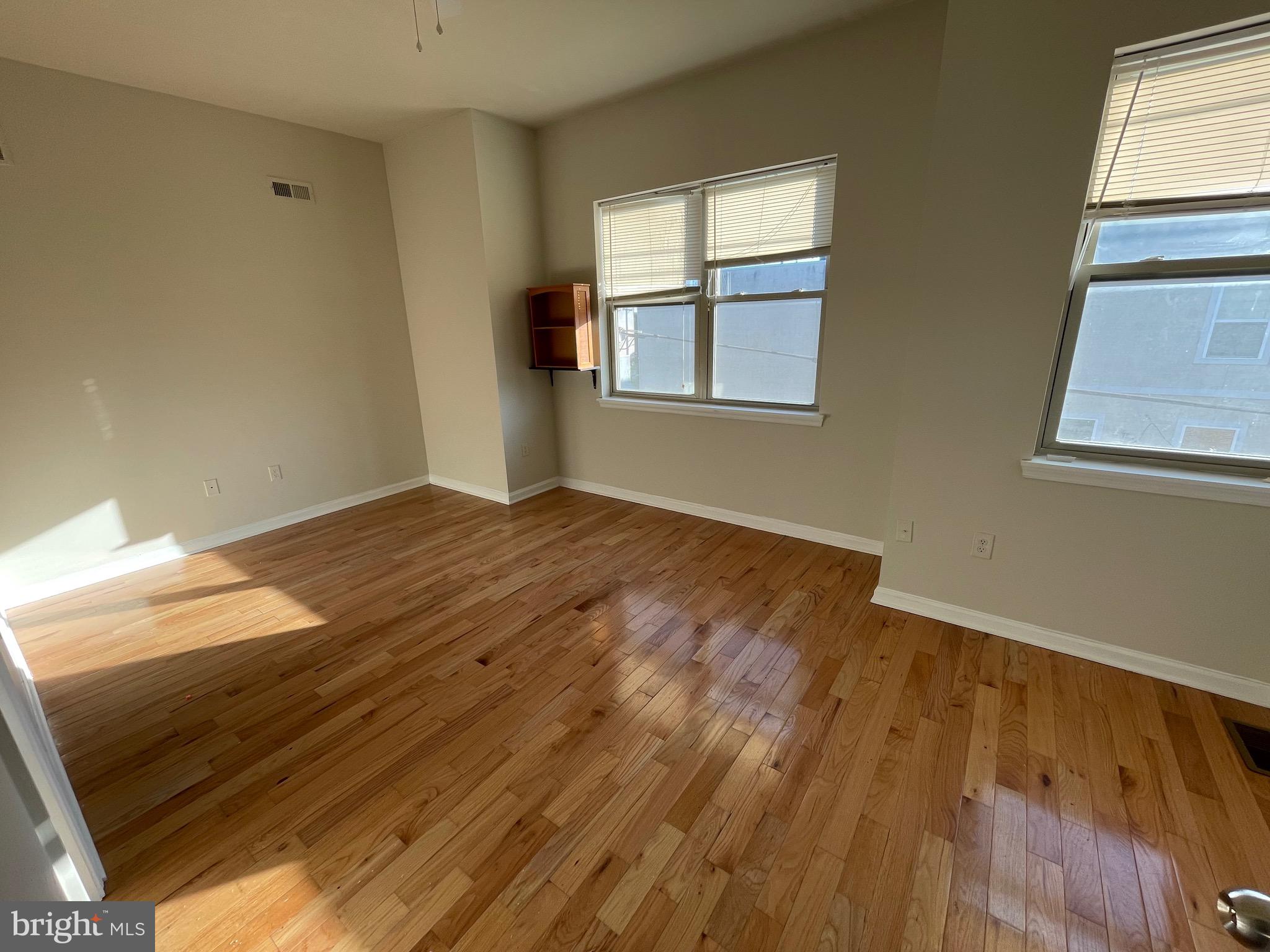 408 Wiota Street Philadelphia, PA 19104 - Photo 12 of 25 a view of an empty room and window