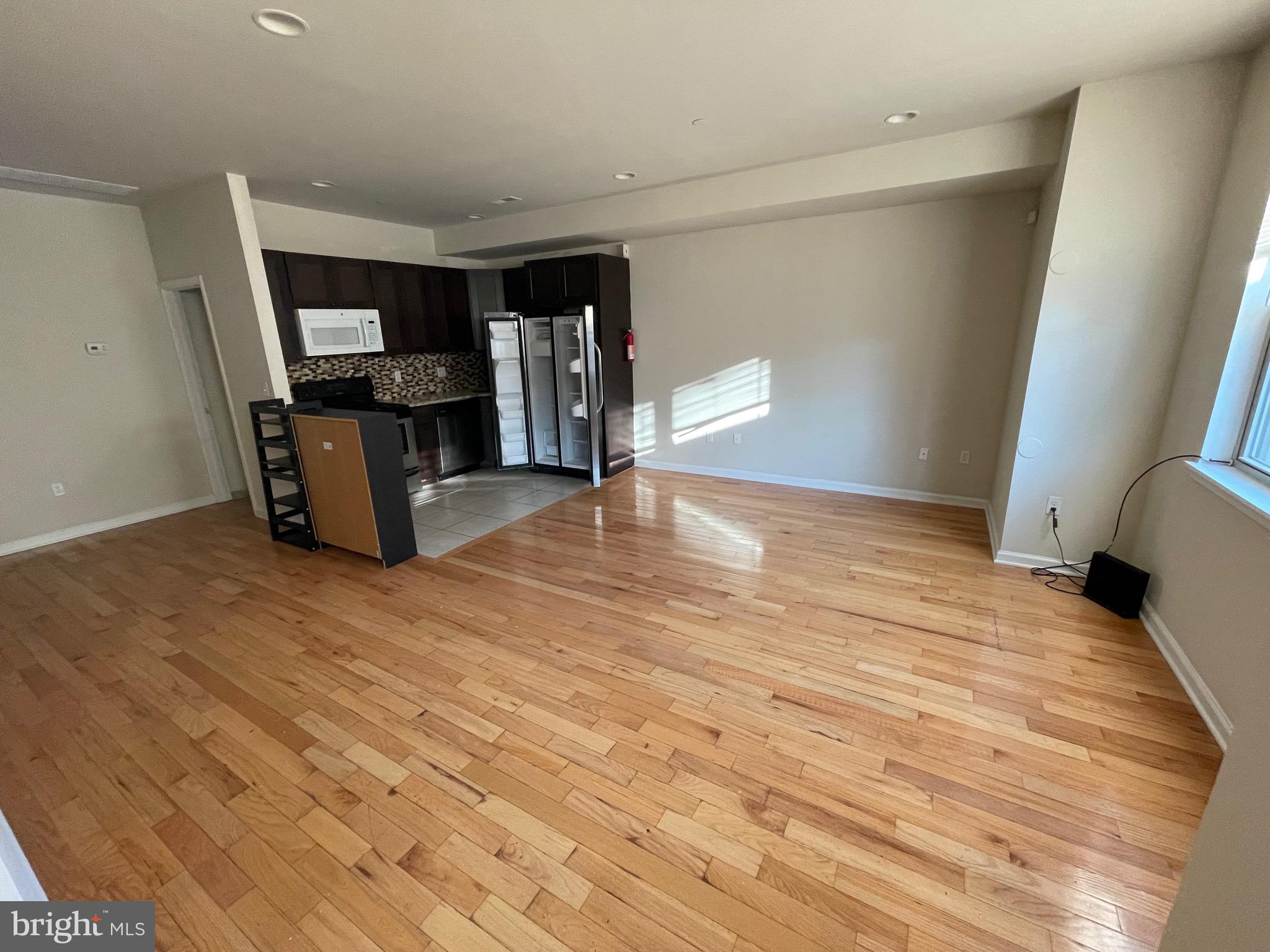 408 Wiota Street Philadelphia, PA 19104 - Photo 5 of 25 a view of a room with a flat screen tv
