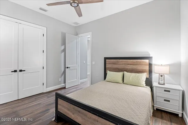 a view of a workspace with furniture and window