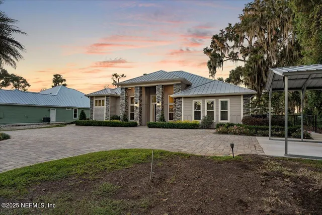 a view of a park with large trees