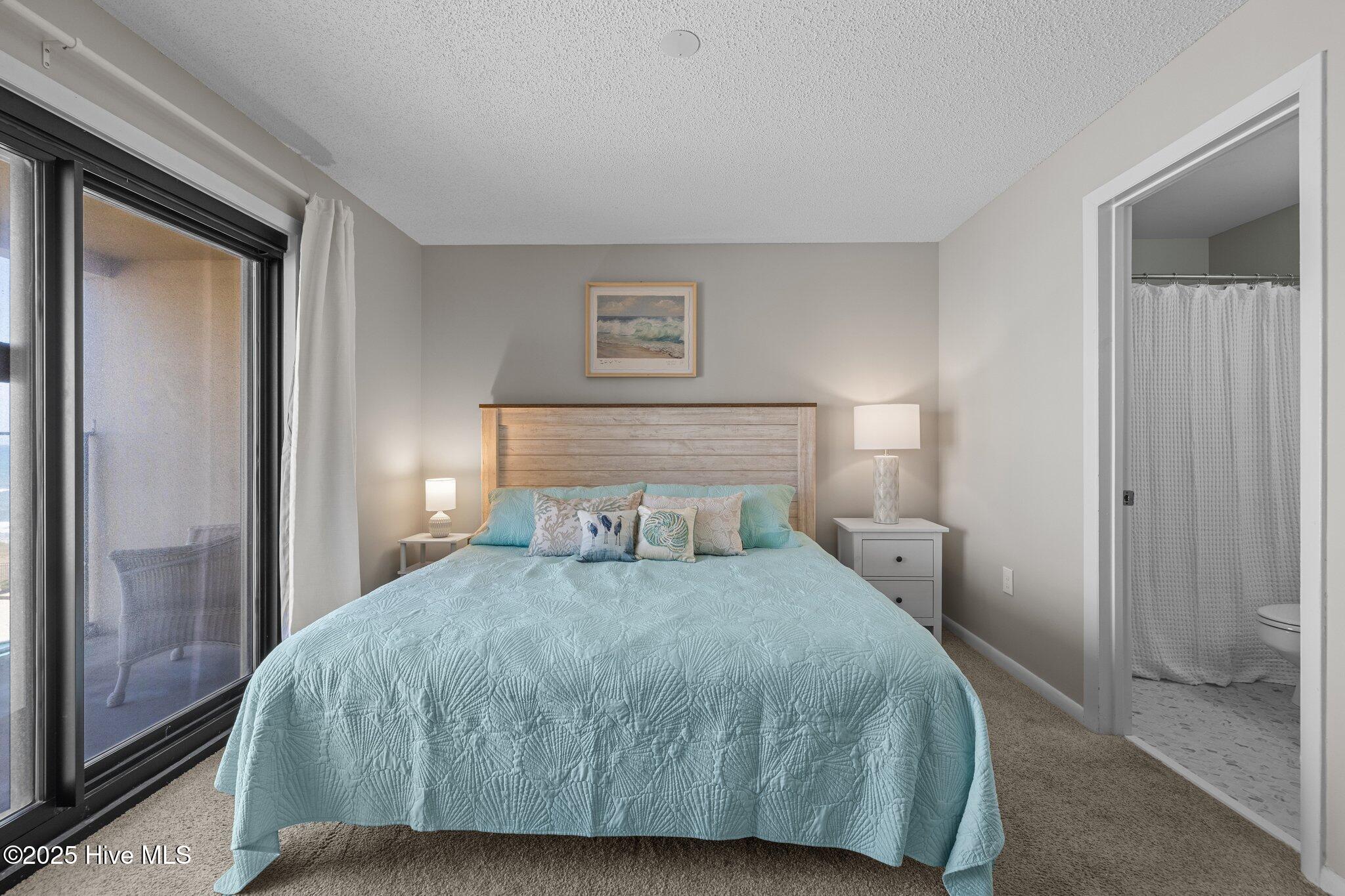 1505 Salter Path Road, Unit 409 Indian Beach, NC 28512 - Photo 20 of 35 Master with Sliding door to Balcony
