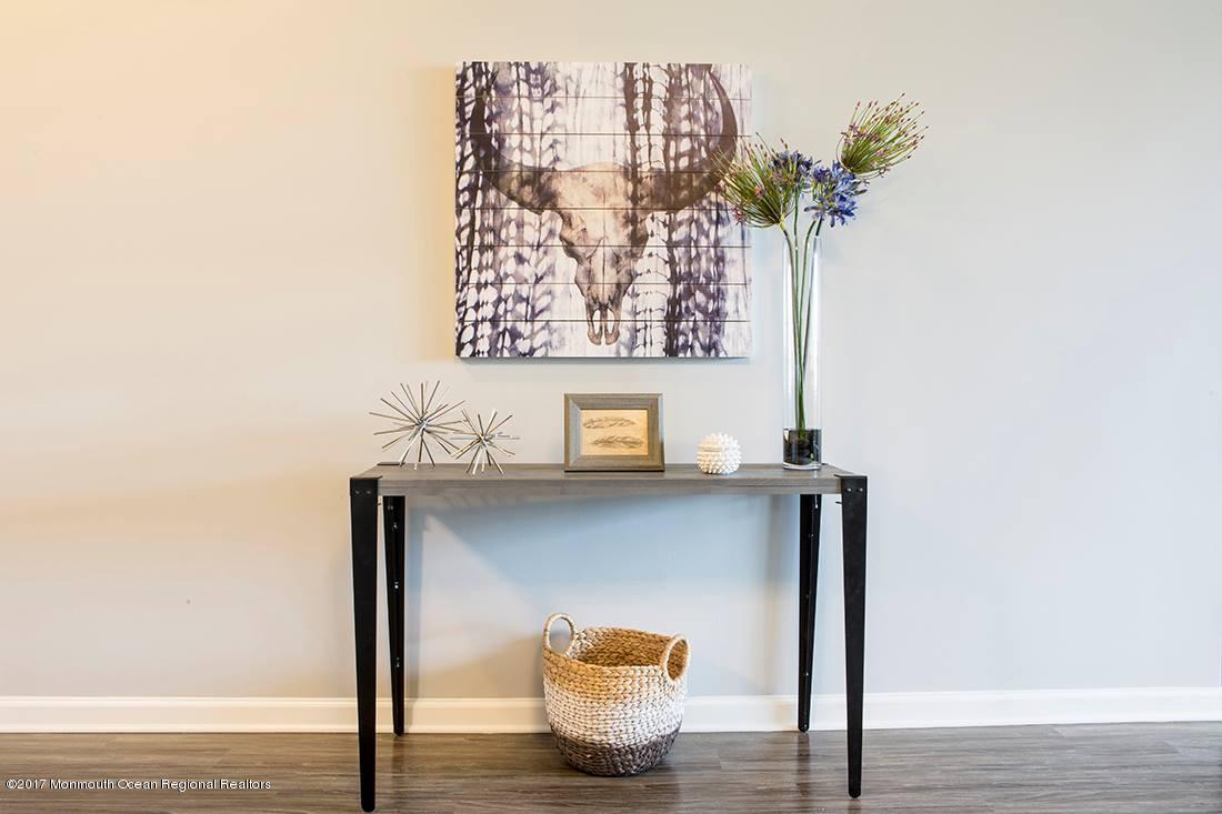 249 Broad Street, Unit 428 Matawan, NJ 07747 - Photo 19 of 27 a front view of a wall with a potted plant