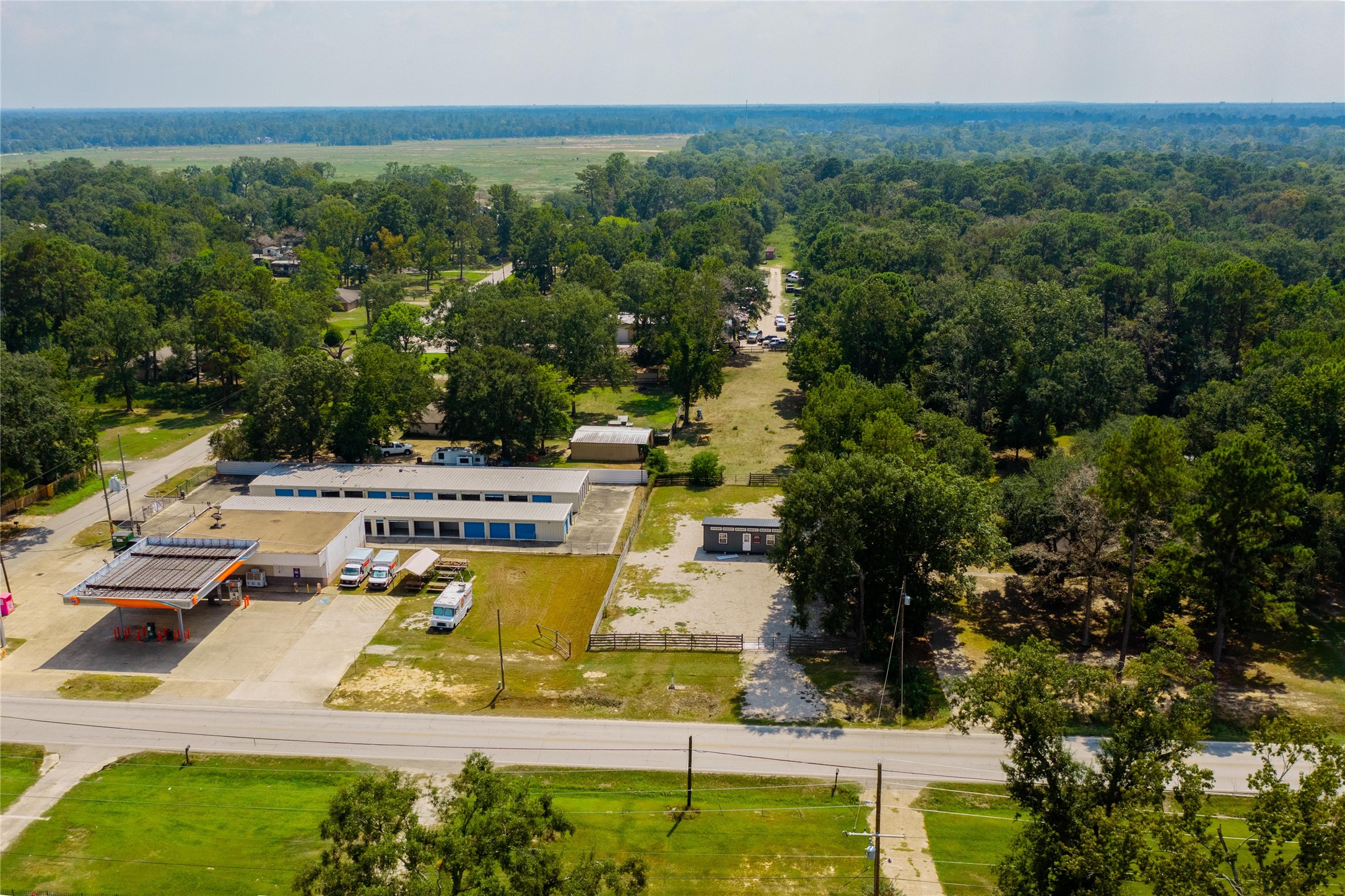 23544 Ford Road Porter, TX 77365 - Photo 11 of 15 a view of a swimming pool with a yard