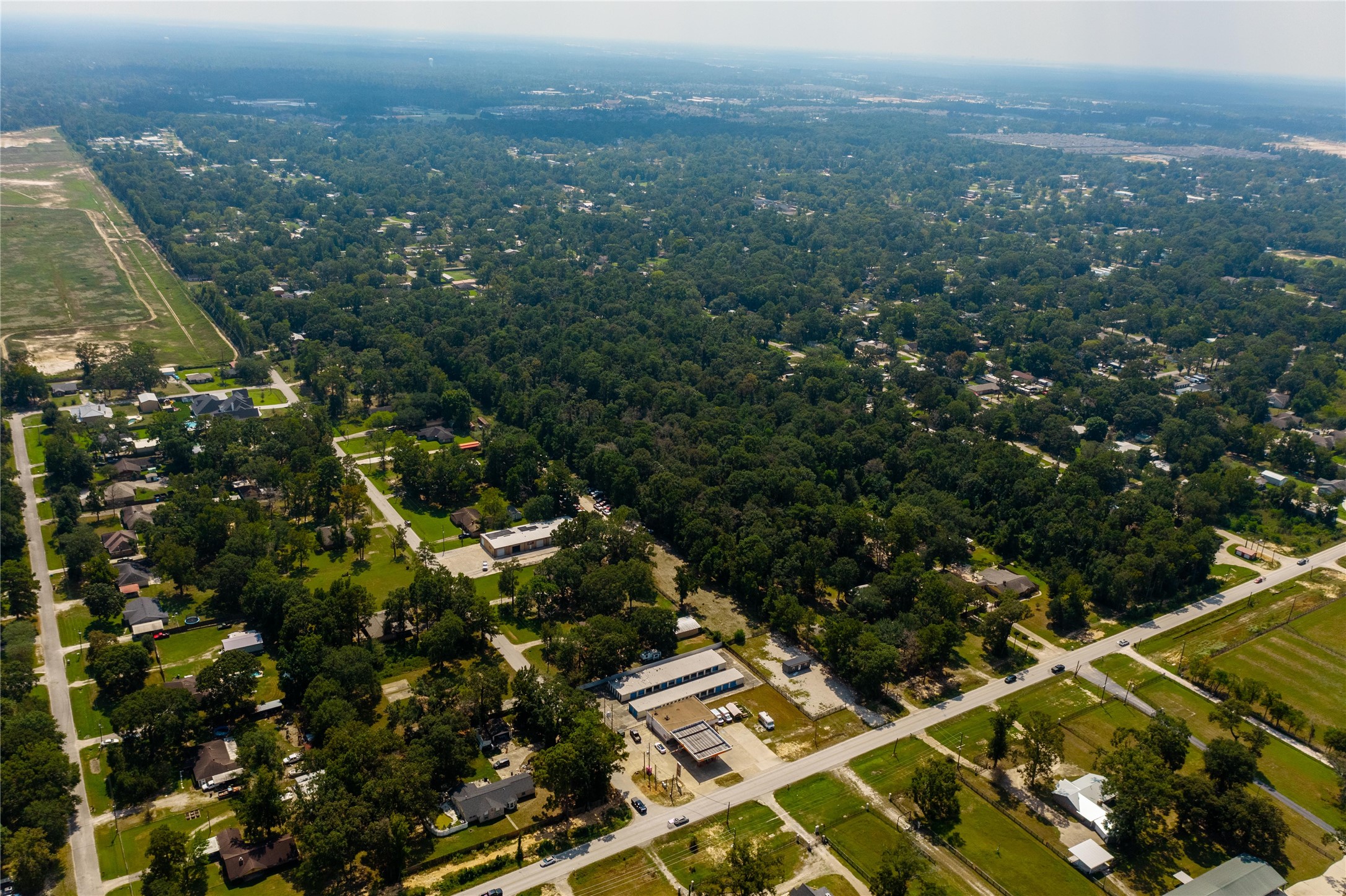23544 Ford Road Porter, TX 77365 - Photo 15 of 15 an aerial view of residential house with green space