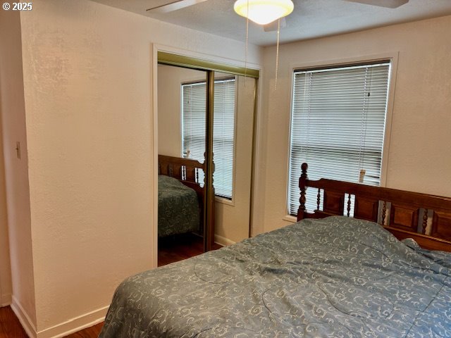 196 Northeast Flagg Street Roseburg, OR 97470 - Photo 18 of 27 a bedroom with a bed and a table