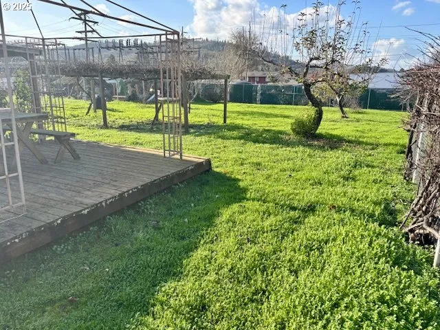 a view of yard with swimming pool