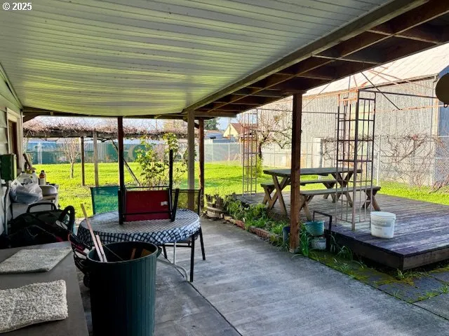 a outdoor space with chairs and a swing