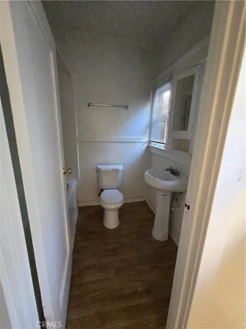 a bathroom with a sink and a toilet
