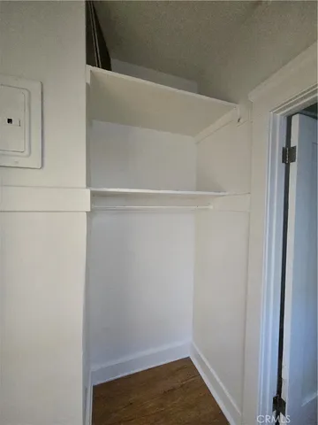 a view of small space with racks on the wall