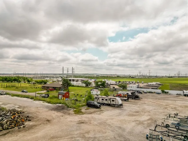 a view of street and car parked