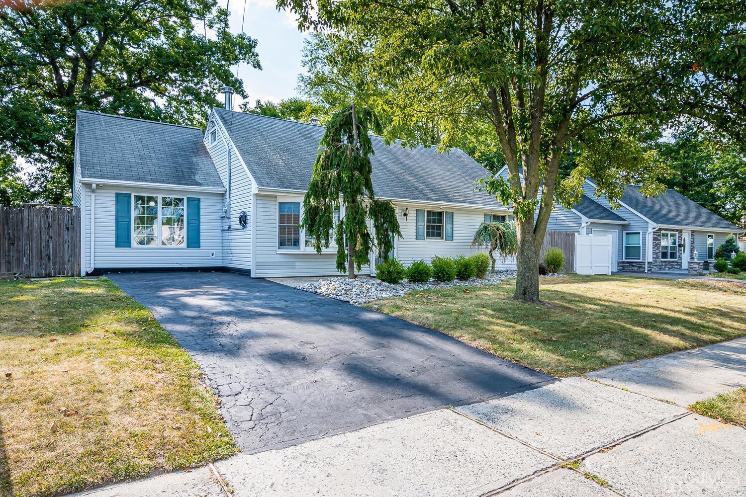 6 Stiles Road Edison, NJ 08817 - Photo 3 of 28 a front view of a house with garden