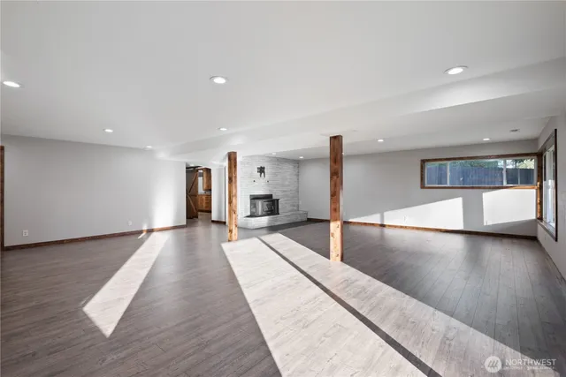 a lobby with a couch and a potted plant on table