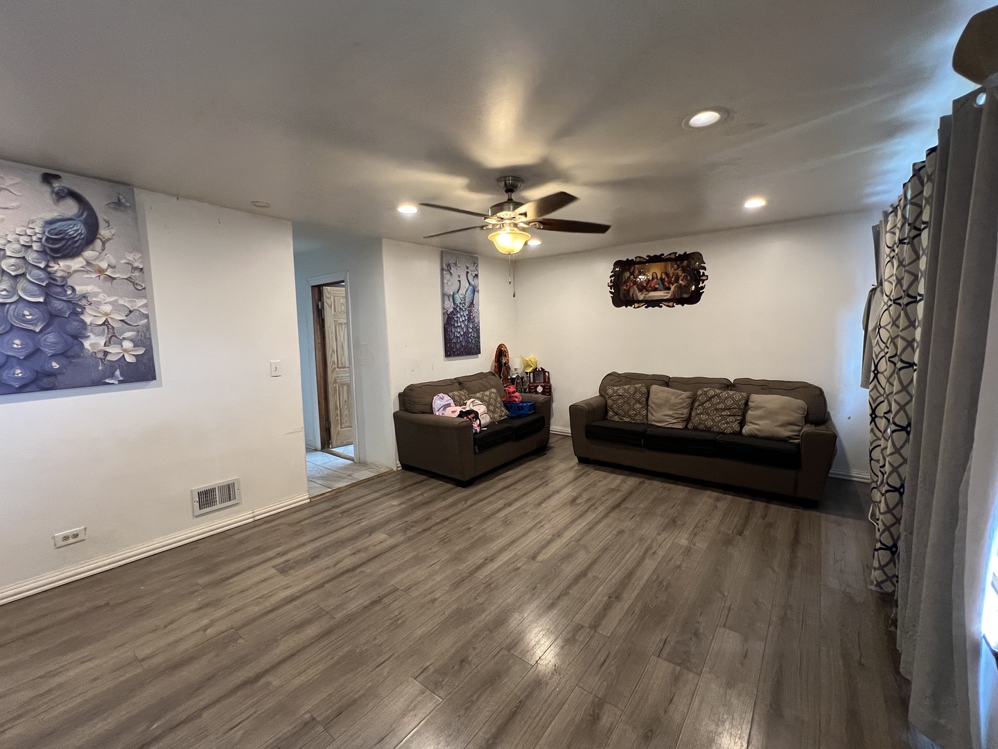 2050 West 52nd Street Chicago, IL 60609 - Photo 2 of 22 a view of a livingroom with furniture and a ceiling fan