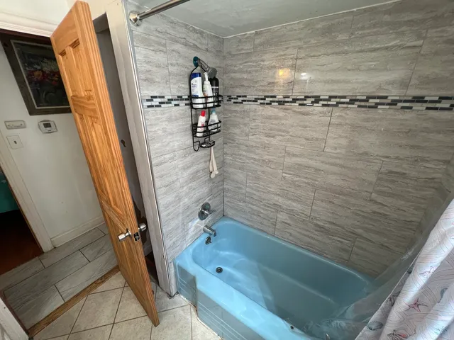 a bathroom with a bathtub