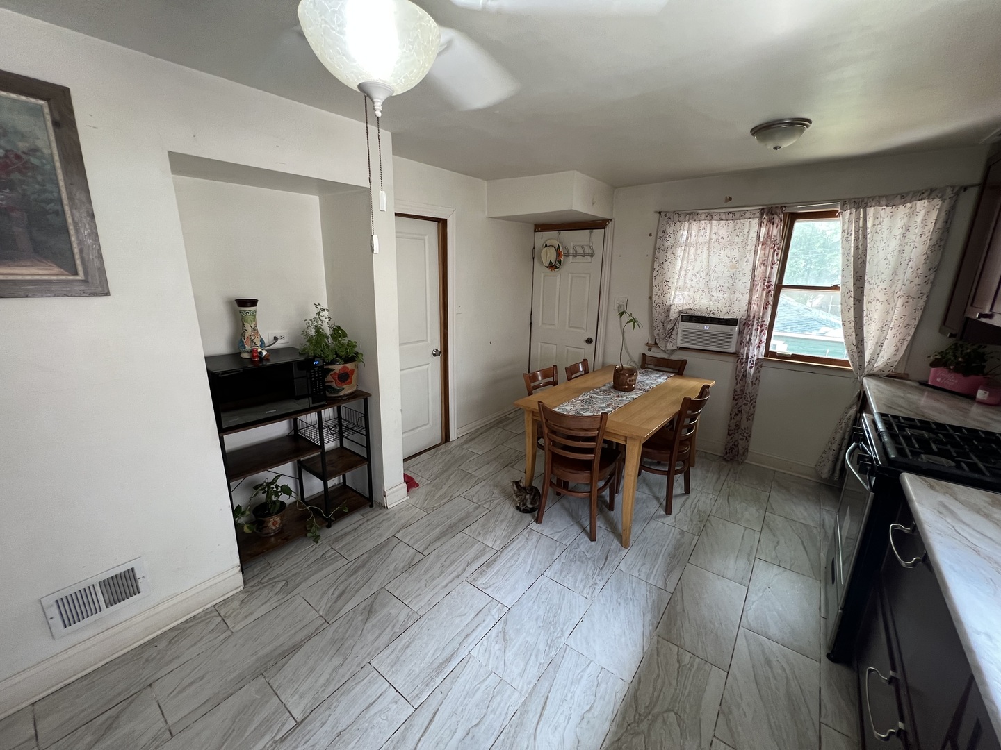 2050 West 52nd Street Chicago, IL 60609 - Photo 9 of 22 a living room with furniture and a wooden floor