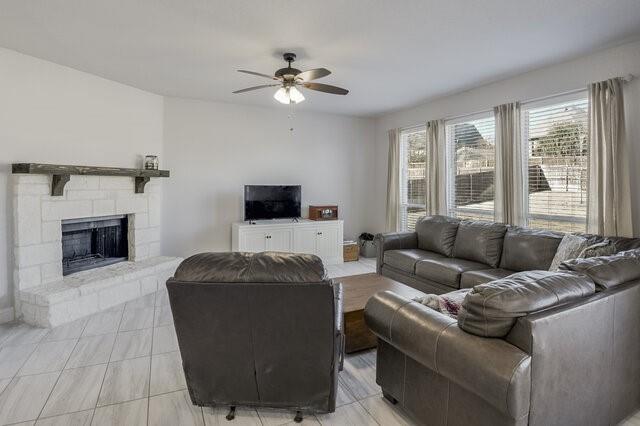 807 Imperial Way Mansfield, TX 76063 - Photo 13 of 39 a living room with furniture and a fireplace