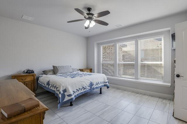 807 Imperial Way Mansfield, TX 76063 - Photo 17 of 39 a bedroom with bed and window