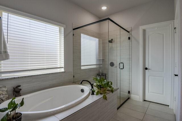 807 Imperial Way Mansfield, TX 76063 - Photo 20 of 39 a bathroom with a bathtub and shower