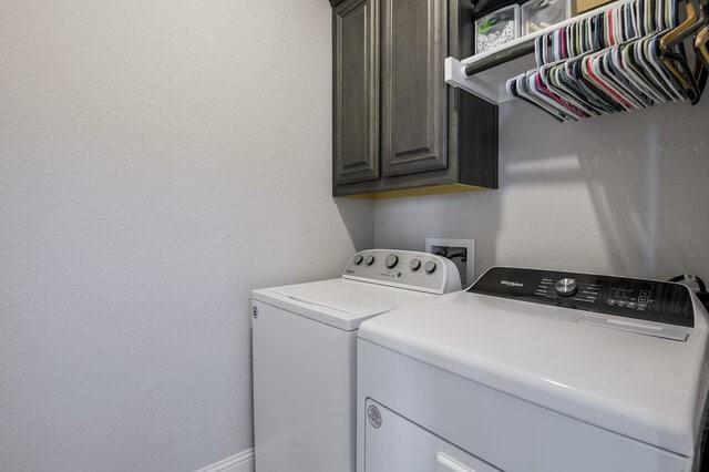 807 Imperial Way Mansfield, TX 76063 - Photo 21 of 39 a utility room with dryer and washer