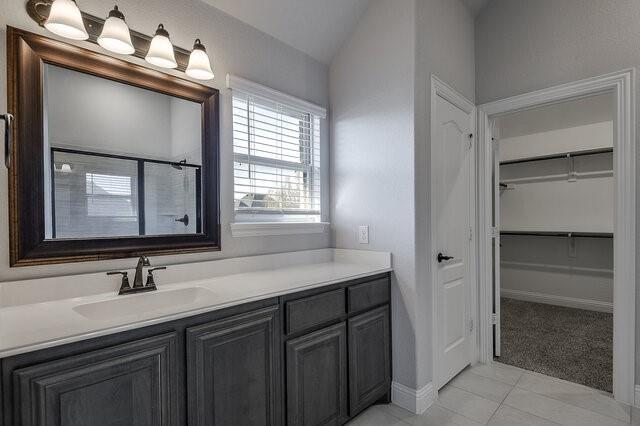 807 Imperial Way Mansfield, TX 76063 - Photo 28 of 39 a bathroom with a sink vanity and a mirror