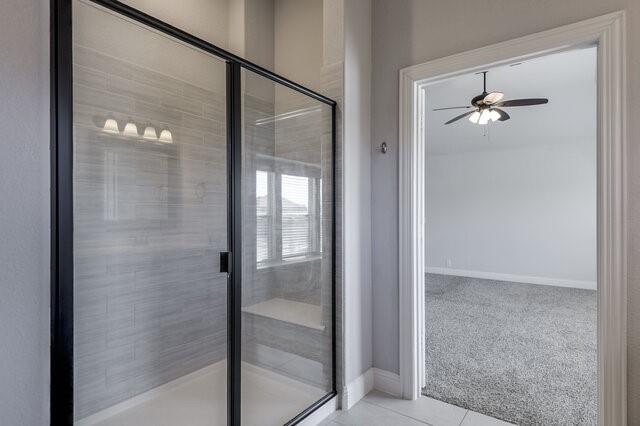 807 Imperial Way Mansfield, TX 76063 - Photo 29 of 39 a bathroom with a glass shower door