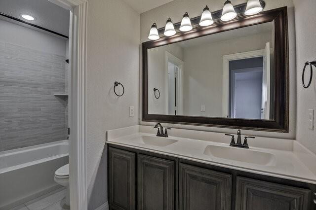 807 Imperial Way Mansfield, TX 76063 - Photo 31 of 39 a bathroom with a sink and a mirror