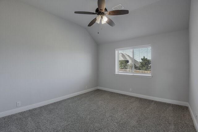 807 Imperial Way Mansfield, TX 76063 - Photo 33 of 39 an empty room with a window and a fan