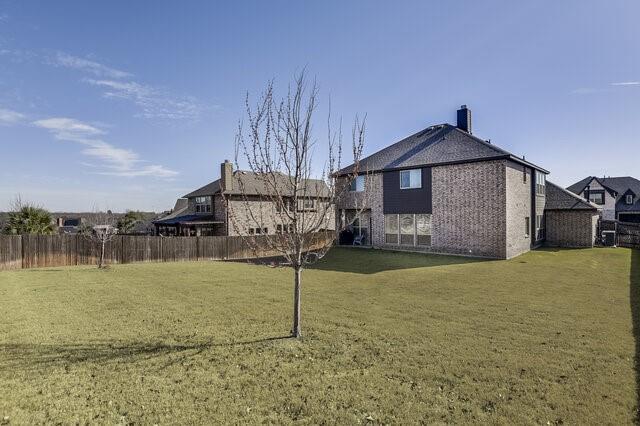 807 Imperial Way Mansfield, TX 76063 - Photo 35 of 39 a front view of a house with a yard