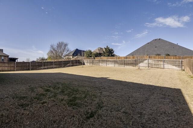 807 Imperial Way Mansfield, TX 76063 - Photo 36 of 39 a view of a house with a yard