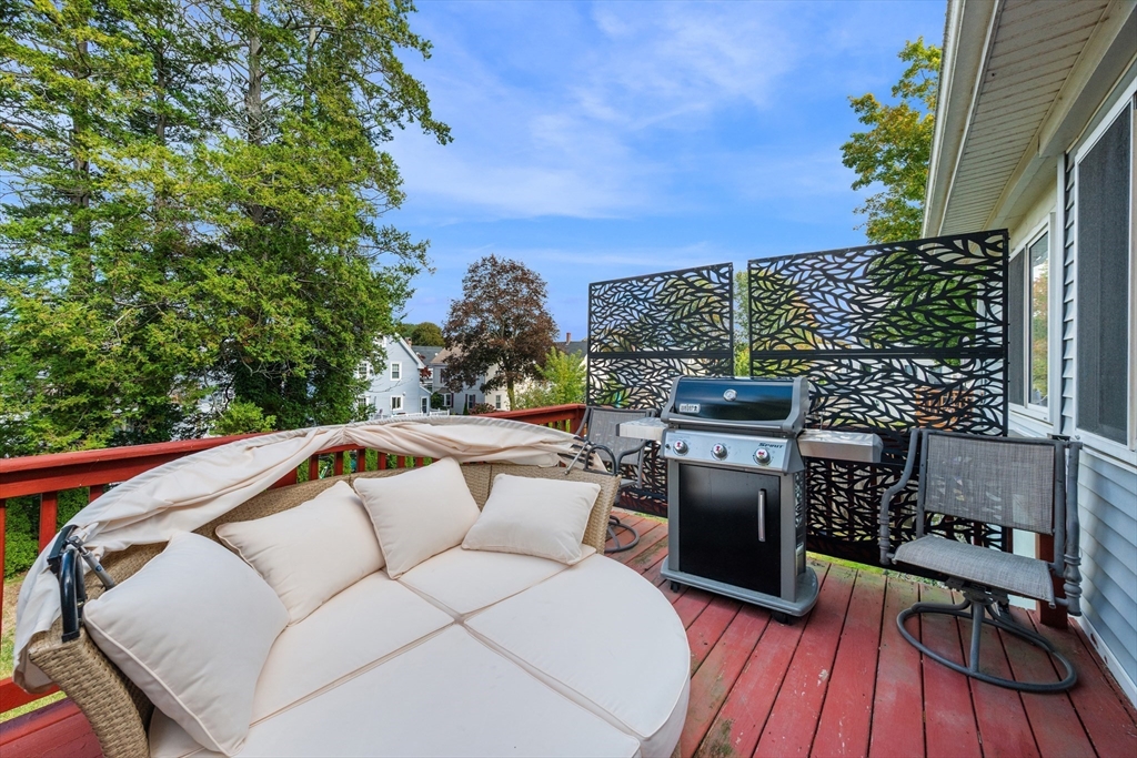 13 State Street Peabody, MA 01960 - Photo 15 of 42 a view of roof deck with chairs and wooden floor