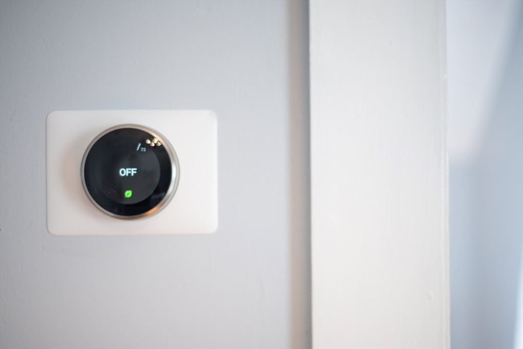 13 State Street Peabody, MA 01960 - Photo 21 of 42 a close view of a utility room with dryer and washer