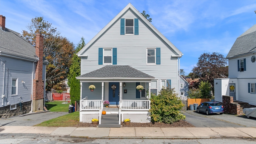 13 State Street Peabody, MA 01960 - Photo 29 of 42 a front view of a house with a yard