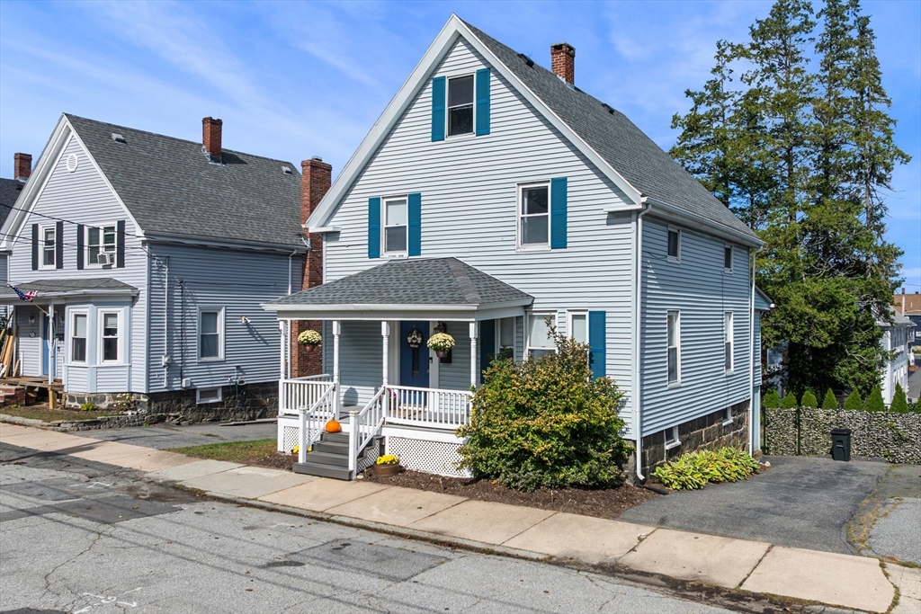 13 State Street Peabody, MA 01960 - Photo 30 of 42 a front view of a house with a yard