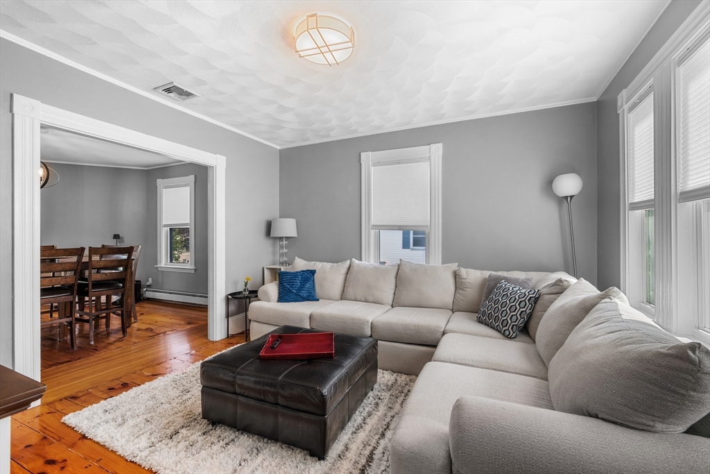 13 State Street Peabody, MA 01960 - Photo 3 of 42 a living room with furniture