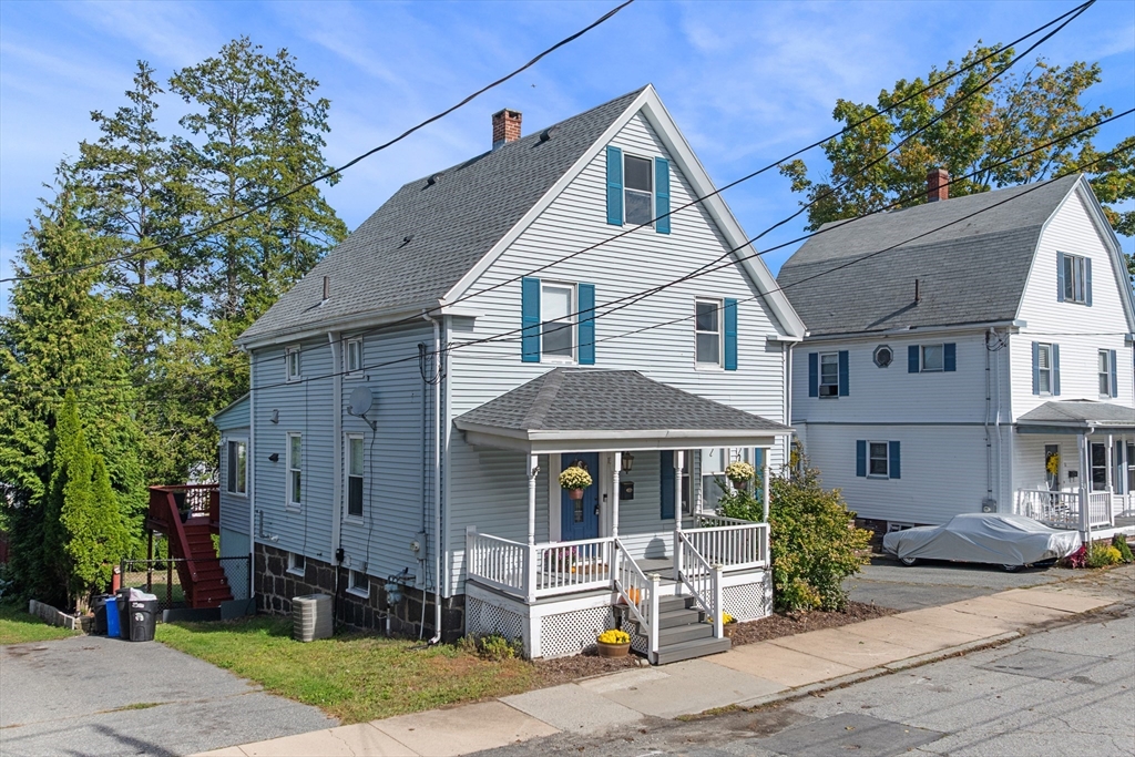 13 State Street Peabody, MA 01960 - Photo 31 of 42 a front view of a house with a garden
