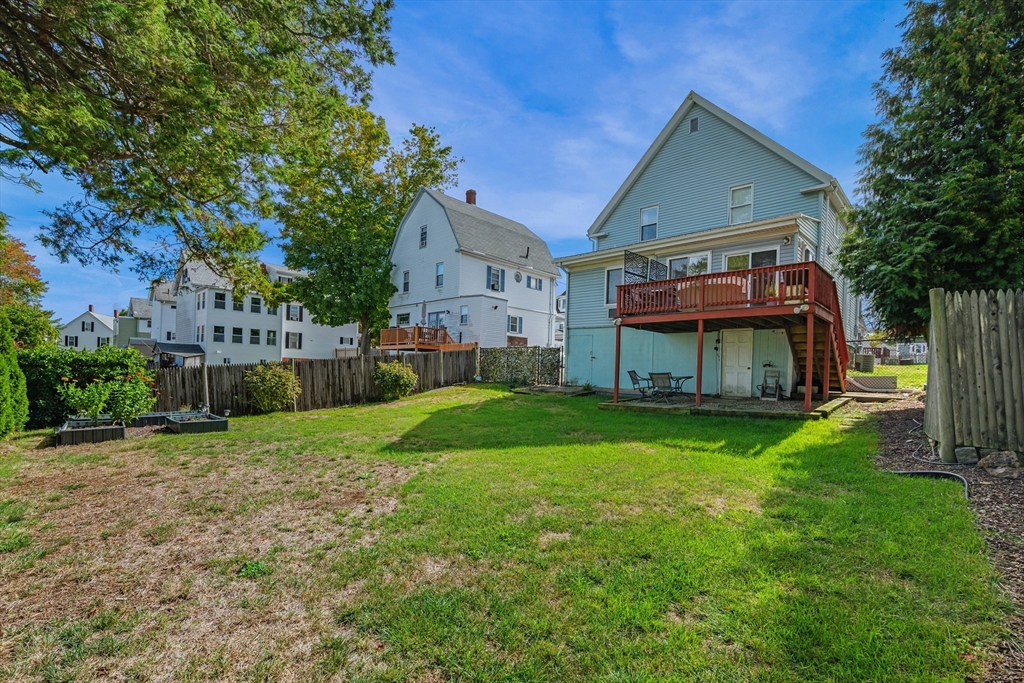 13 State Street Peabody, MA 01960 - Photo 33 of 42 a view of house with garden and tall trees