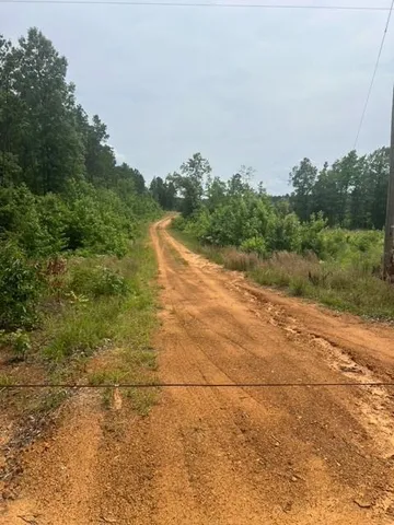 a view of a lake with a big yard