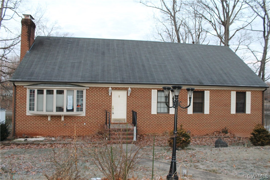 a backyard of a house with seating space