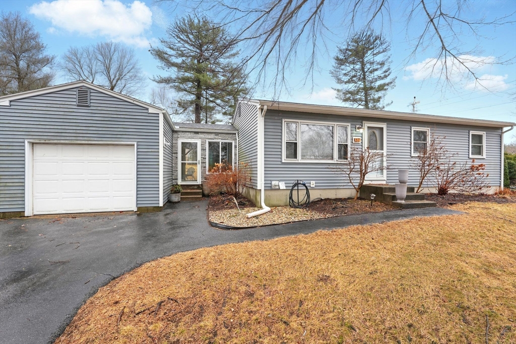 37 Gourley Road Springfield, MA 01129 - Photo 1 of 41 a front view of a house with yard patio and fire pit