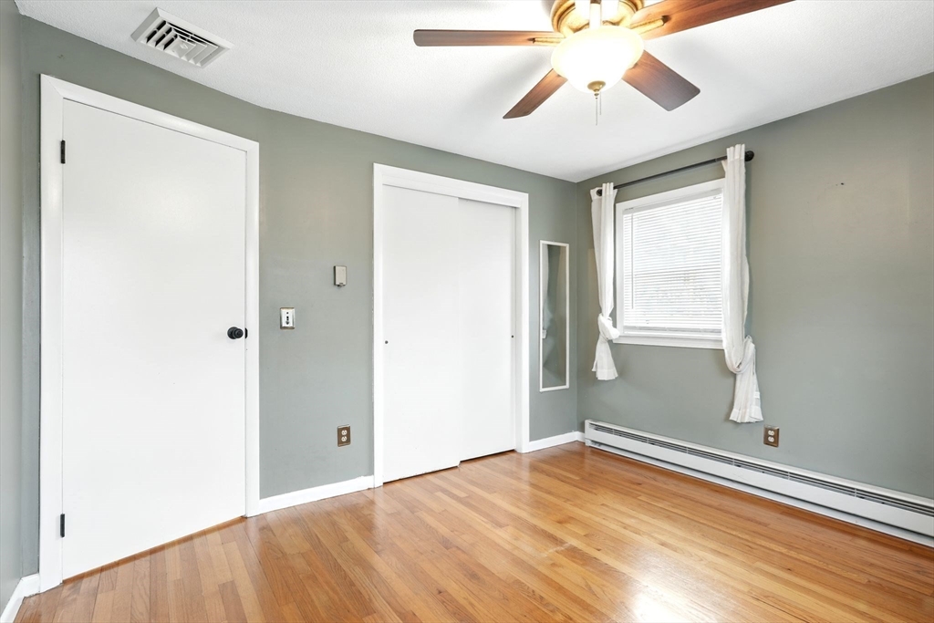 37 Gourley Road Springfield, MA 01129 - Photo 20 of 41 a view of a room with a chandelier fan and a window