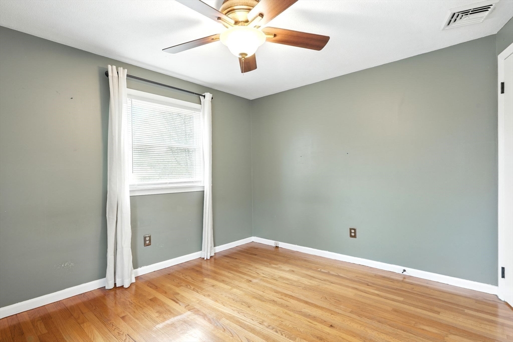 37 Gourley Road Springfield, MA 01129 - Photo 22 of 41 a view of a room with wooden floor and fan