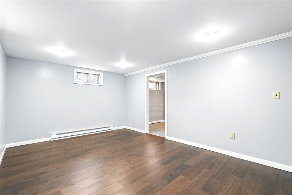 37 Gourley Road Springfield, MA 01129 - Photo 30 of 41 an empty room with wooden floor and windows