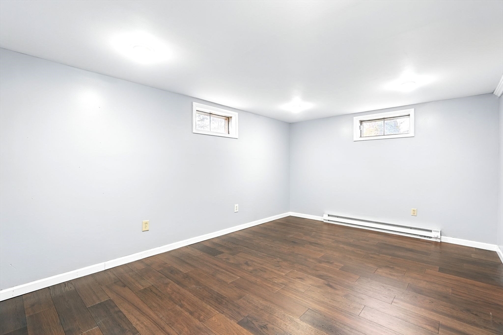 37 Gourley Road Springfield, MA 01129 - Photo 31 of 41 an empty room with wooden floor and windows